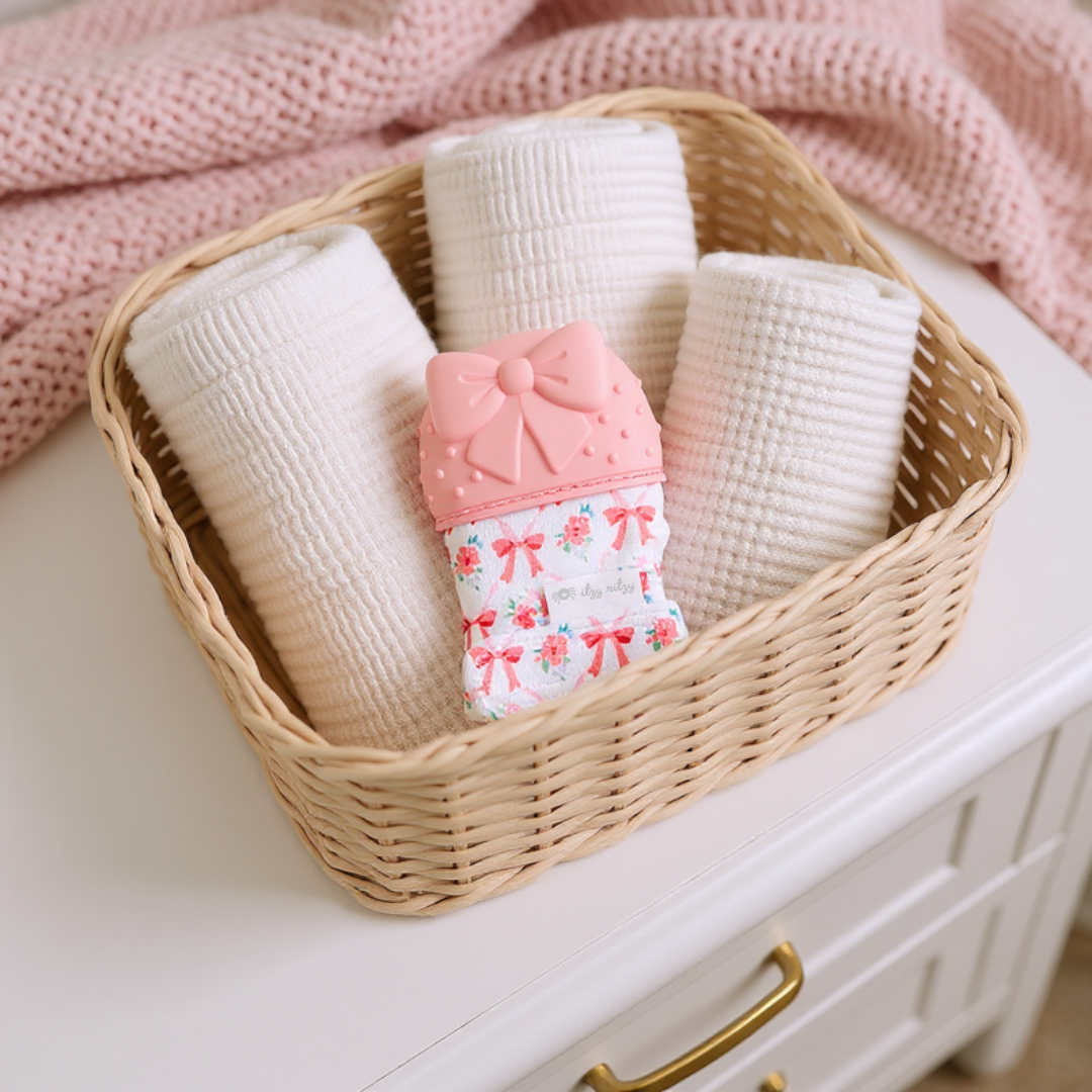 Bow Silicone Teething Itzy Mitt™