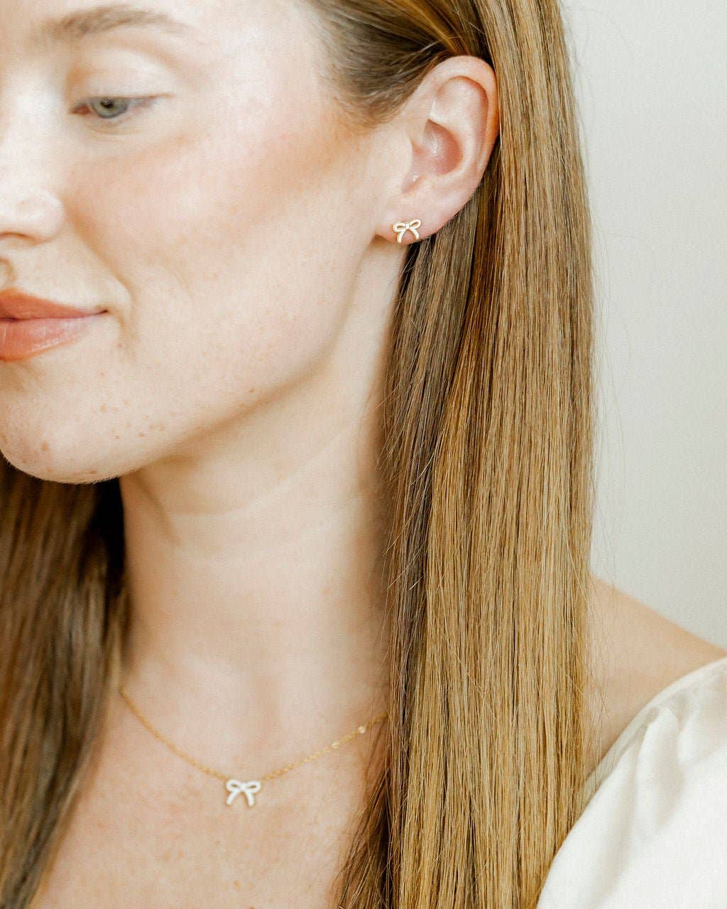 White Sadie Bow Screwback Stud Earrings