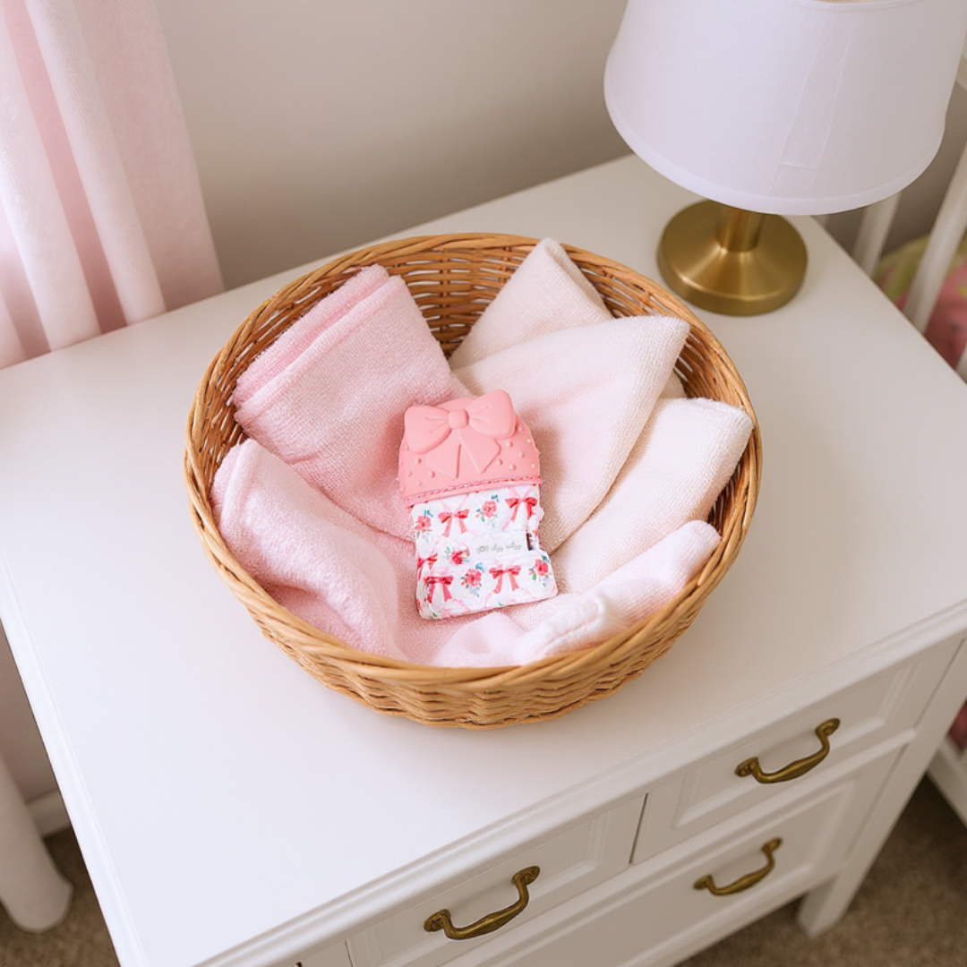 Bow Silicone Teething Itzy Mitt™