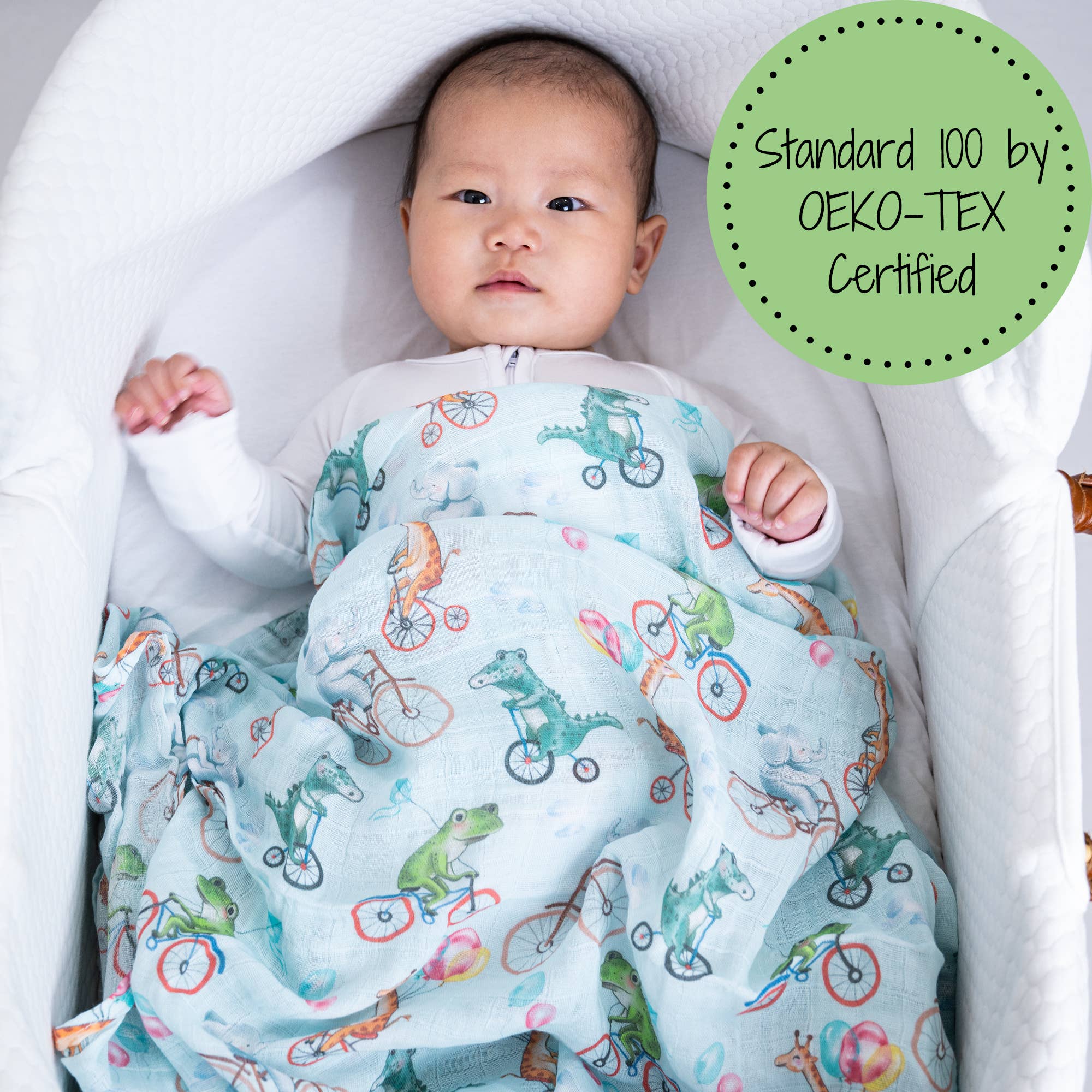 Animals on Bike Muslin Swaddle Blanket